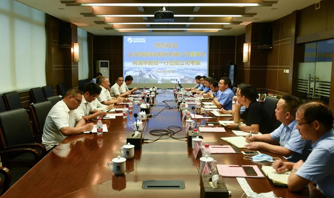 周健君會見山河智能裝備股份有限公司董事長何清華一行.jpg